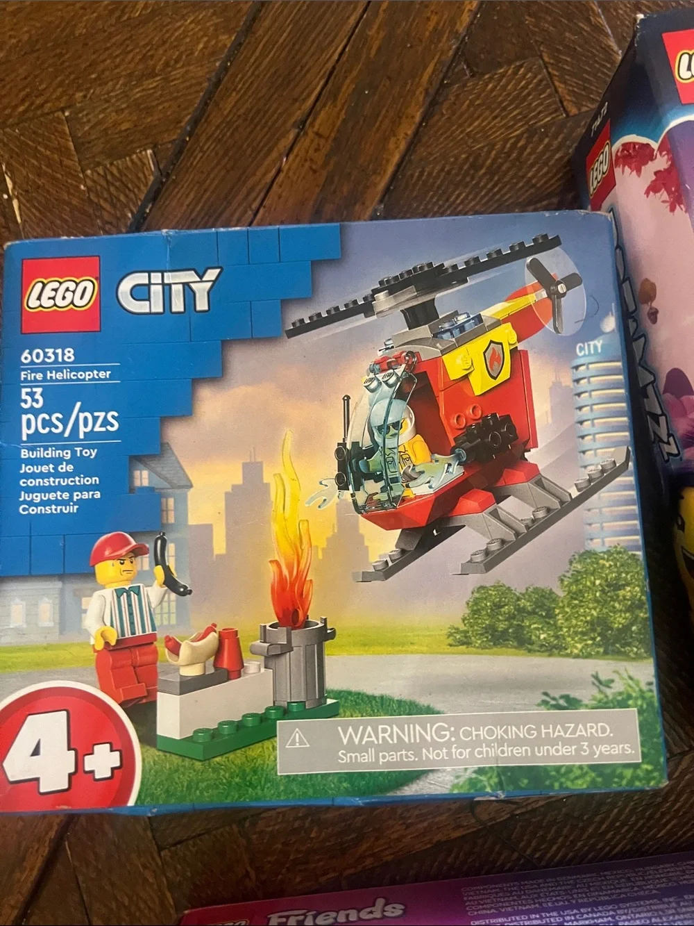 Firm price NIB 3 LEGO sets ice cream truck with characters, helicopter , etc